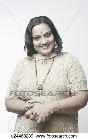 Stock Photo - Portrait of a mature woman smiling. Fotosearch