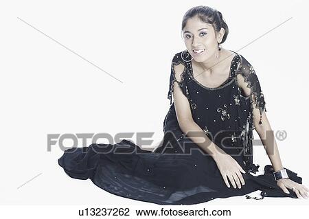 Stock Image - Portrait of a young woman smiling. Fotosearch
