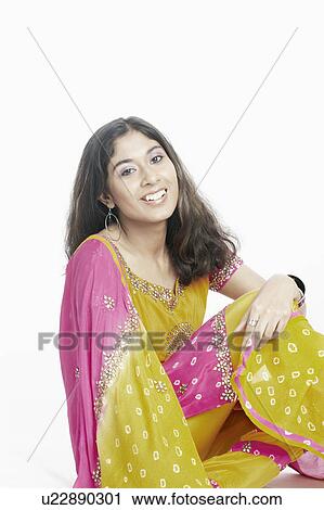 Portrait of a young woman smiling View Large Photo Image Stock Image - Portrait of a young woman smiling. Fotosearch