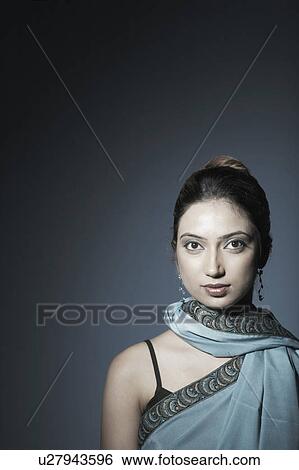 Portrait of a young woman View Large Photo Image Stock Photograph - Portrait of a young woman. Fotosearch