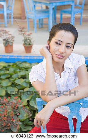 Stock Image - Close-up of a young woman looking away. Fotosearch
