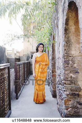 Portrait of a mid adult woman smiling View Large Photo Image Stock Photo - Portrait of a mid adult woman smiling. Fotosearch