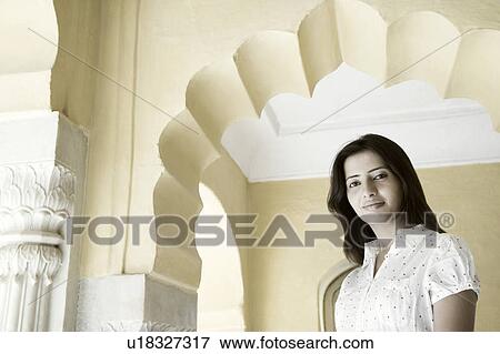 Stock Photo - Portrait of a mid adult woman smiling. Fotosearch