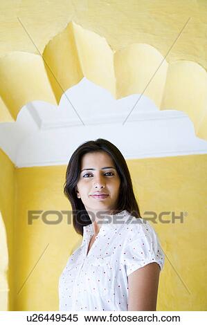 Stock Photography - Portrait of a mid adult woman smiling. Fotosearch