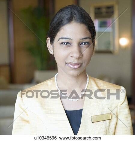 Portrait of a waitress smiling View Large Photo Image Stock Photograph - Portrait of a waitress smiling. Fotosearch