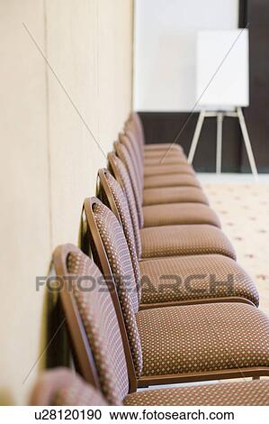 Empty chairs in a board room View Large Photo Image Stock Image - Empty chairs in a board room. Fotosearch
