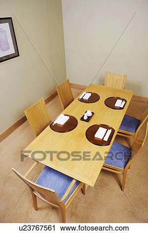 High angle view of a place setting in a restaurant View Large Photo Image Stock Image - High angle view of a place setting in a restaurant. Fotosearch