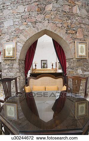 Reflection of an arch on a table glass View Large Photo Image Stock Image - Reflection of an arch on a table glass. Fotosearch
