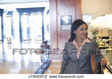 Close-up of a businesswoman smiling View Large Photo Image Stock Image - Close-up of a businesswoman smiling. Fotosearch