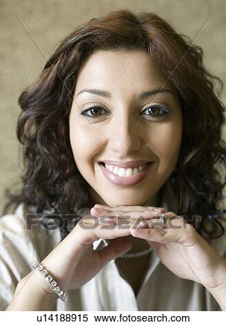 Stock Photography - Portrait of a businesswoman smiling. Fotosearch