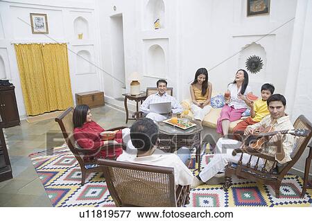 Stock Photo - Group of people sitting together. Fotosearch