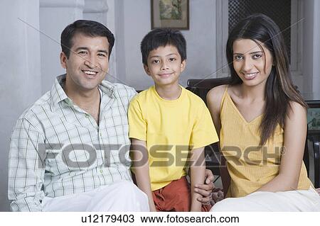 Portrait of a family smiling View Large Photo Image Stock Image - Portrait of a family smiling. Fotosearch