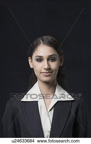 Portrait of a businesswoman smirking View Large Photo Image Picture - Portrait of a businesswoman smirking. Fotosearch
