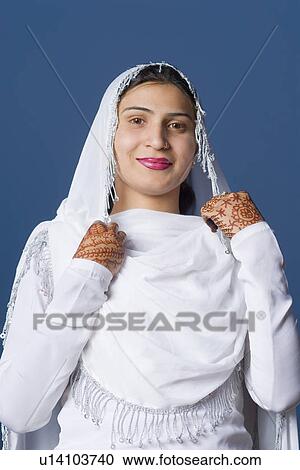 Portrait of a young woman smiling View Large Photo Image Stock Image - Portrait of a young woman smiling. Fotosearch