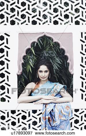 Portrait of a young woman View Large Photo Image Stock Photo - Portrait of a young woman. Fotosearch
