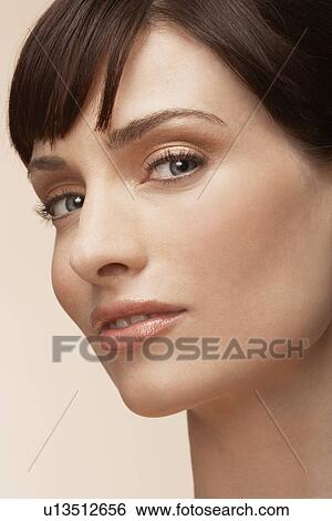 Mid adult woman (portrait) View Large Photo Image Stock Photograph - Mid adult woman (portrait). Fotosearch