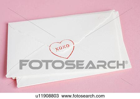 Stock Image - Envelopes of Valentine cards (close-up). Fotosearch