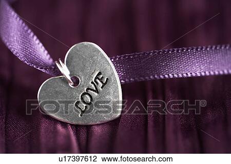 Love heart pendant (close-up) View Large Photo Image Stock Image - Love heart pendant (close-up). Fotosearch