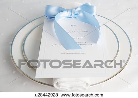 Place setting with menu View Large Photo Image Stock Photo - Place setting with menu. Fotosearch