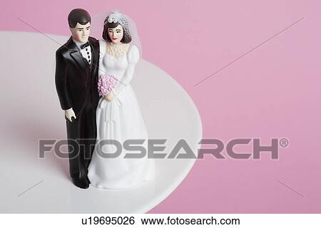Wedding cake figurines View Large Photo Image Stock Photograph - Wedding cake figurines. Fotosearch