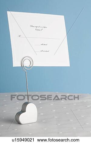 Wedding invitation on holder View Large Photo Image Stock Image - Wedding invitation on holder. Fotosearch