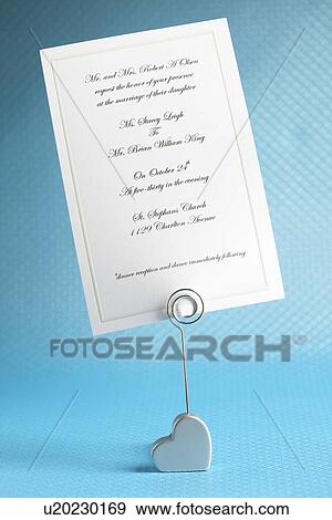 Wedding invitation on holder View Large Photo Image Stock Photo - Wedding invitation on holder. Fotosearch