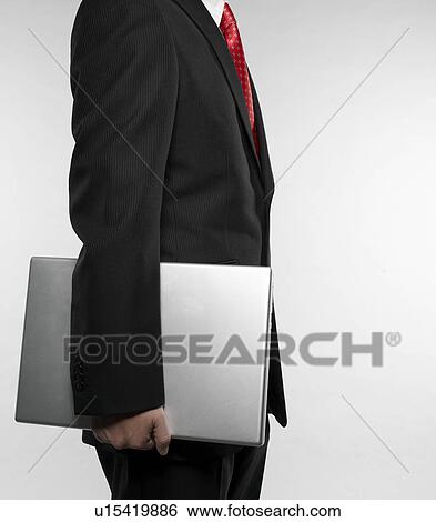 Businessman with Laptop View Large Photo Image Stock Photograph - Businessman with Laptop. Fotosearch