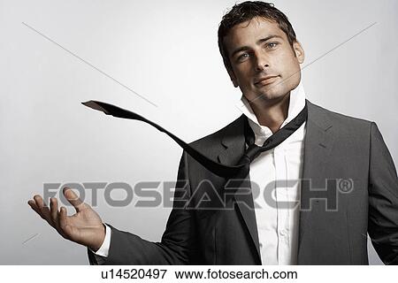 Businessman with necktie in air View Large Photo Image Stock Photo - Businessman with necktie in air. Fotosearch