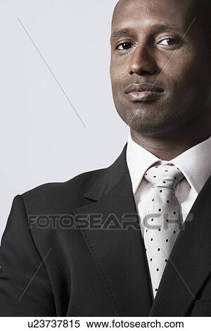 Portrait of confident businessman View Large Photo Image Stock Photography - Portrait of confident businessman. Fotosearch