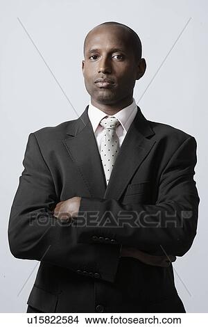Picture - Portrait of mid adult businessman. Fotosearch