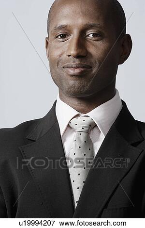 Portrait of mid adult businessman View Large Photo Image Stock Photo - Portrait of mid adult businessman. Fotosearch
