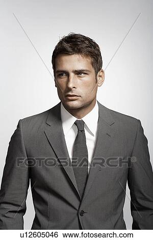 Portrait of mid adult man in suit View Large Photo Image Stock Photograph - Portrait of mid adult man in suit. Fotosearch