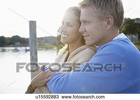Couple hugging View Large Photo Image Stock Image - Couple hugging. Fotosearch
