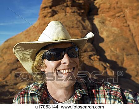 Mid Adult Man in Cowboy Hat View Large Photo Image Picture - Mid Adult Man in Cowboy Hat. Fotosearch