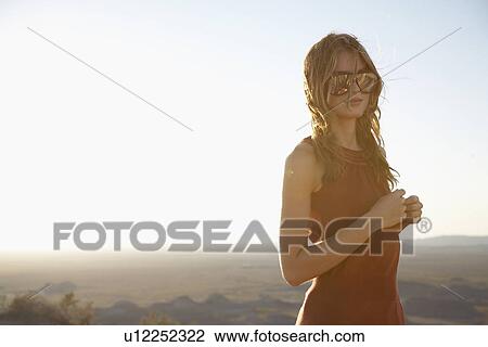 Young woman in desert, Arizona, USA View Large Photo Image Stock Image - Young woman in desert, Arizona, USA. Fotosearch