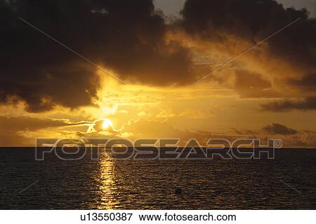 Stock Photo - Setting Sun. Fotosearch