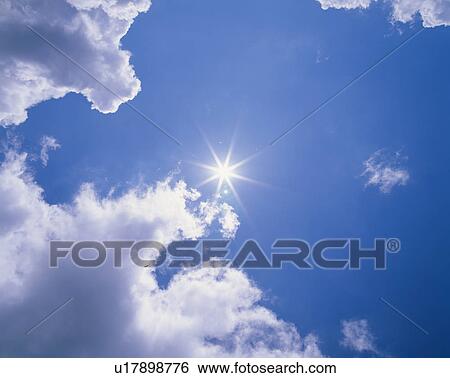Stock Photograph - Sun And Clouds. Fotosearch