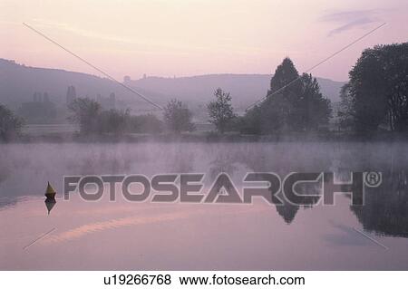 Stock Photo - A Forest And A Lake. Fotosearch