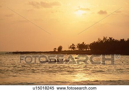 Stock Photography - Coastline With Kayaking People. Fotosearch