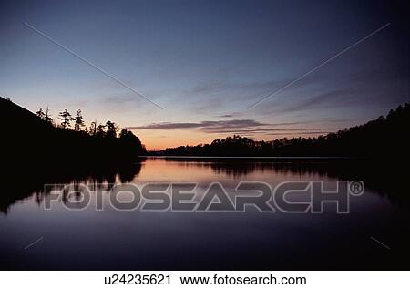 Stock Image - Lake In Evening. Fotosearch