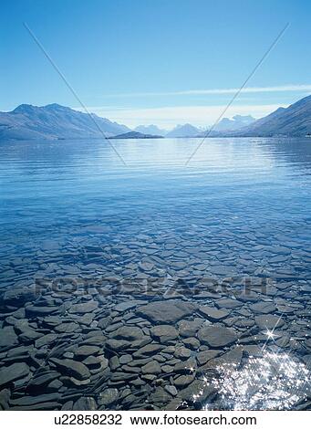 Lake Surrounded By Mountains View Large Photo Image Stock Image - Lake Surrounded By Mountains. Fotosearch
