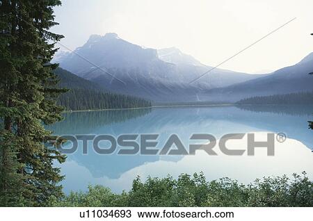 The Canadian Rockies And Emerald Lake View Large Photo Image Stock Image - The Canadian Rockies And Emerald Lake. Fotosearch