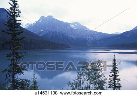 Stock Photo - The Canadian Rockies And Emerald Lake. Fotosearch