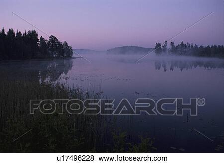 The Lakeside In A Morning Glow View Large Photo Image Stock Photo - The Lakeside In A Morning Glow. Fotosearch