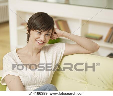 Stock Photo - Portrait of Young Woman. Fotosearch