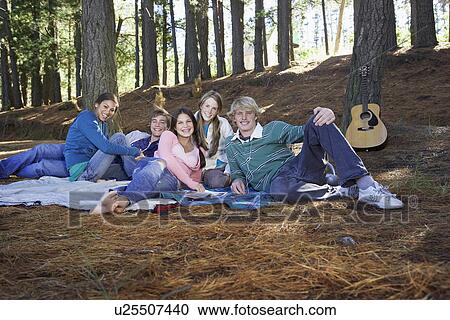 Group portrait of teenagers in forest View Large Photo Image Stock Image - Group portrait of teenagers in forest. Fotosearch