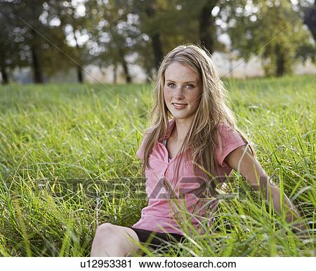 Teenage Girl Sitting in Field View Large Photo Image Stock Image - Teenage Girl Sitting in Field. Fotosearch