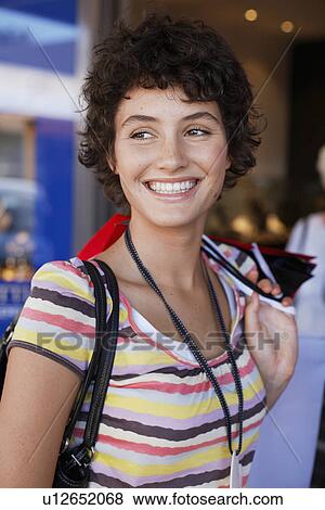 Teenage girl with shopping bags View Large Photo Image Stock Photo - Teenage girl with shopping bags. Fotosearch