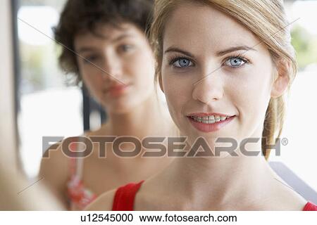 Stock Image - Young woman with braces. Fotosearch
