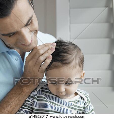 Stock Photo - Father with baby boy (1-2). Fotosearch